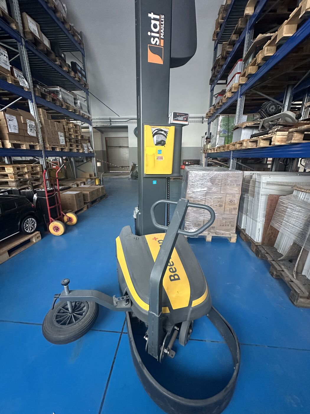 ALT charger and lithium battery on a workshop bench