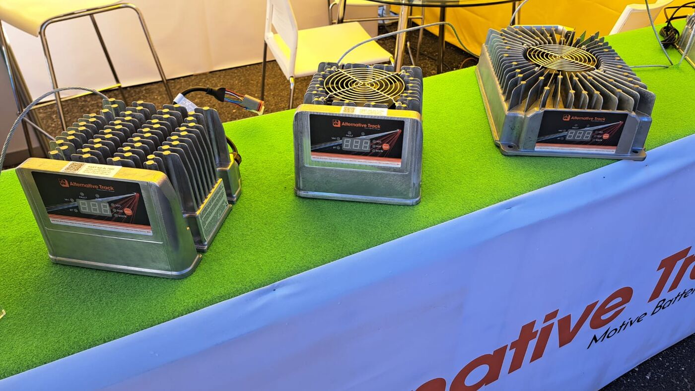 Trade show display with Alternative Track signage