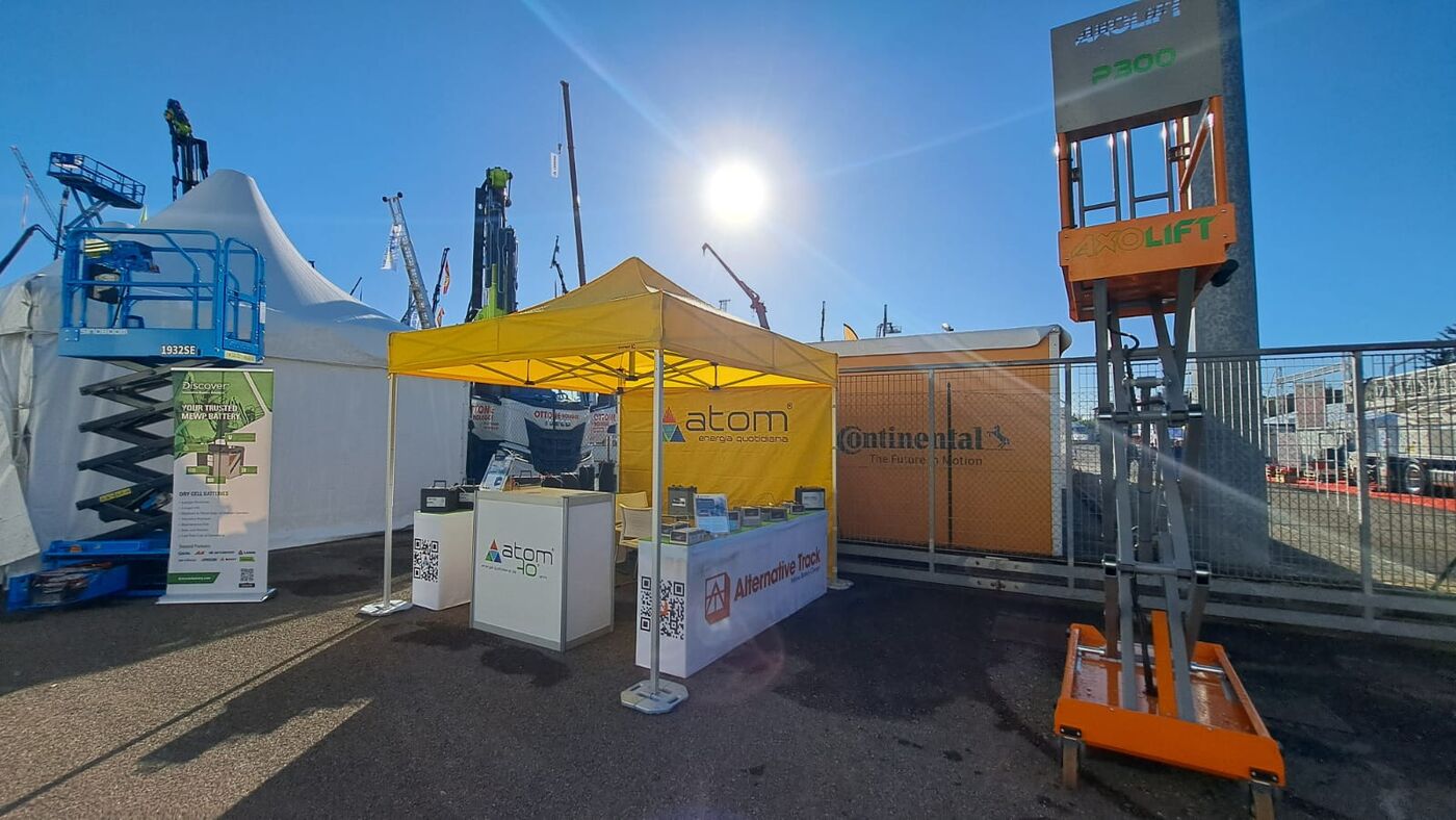 Trade show floor with Alternative Track display