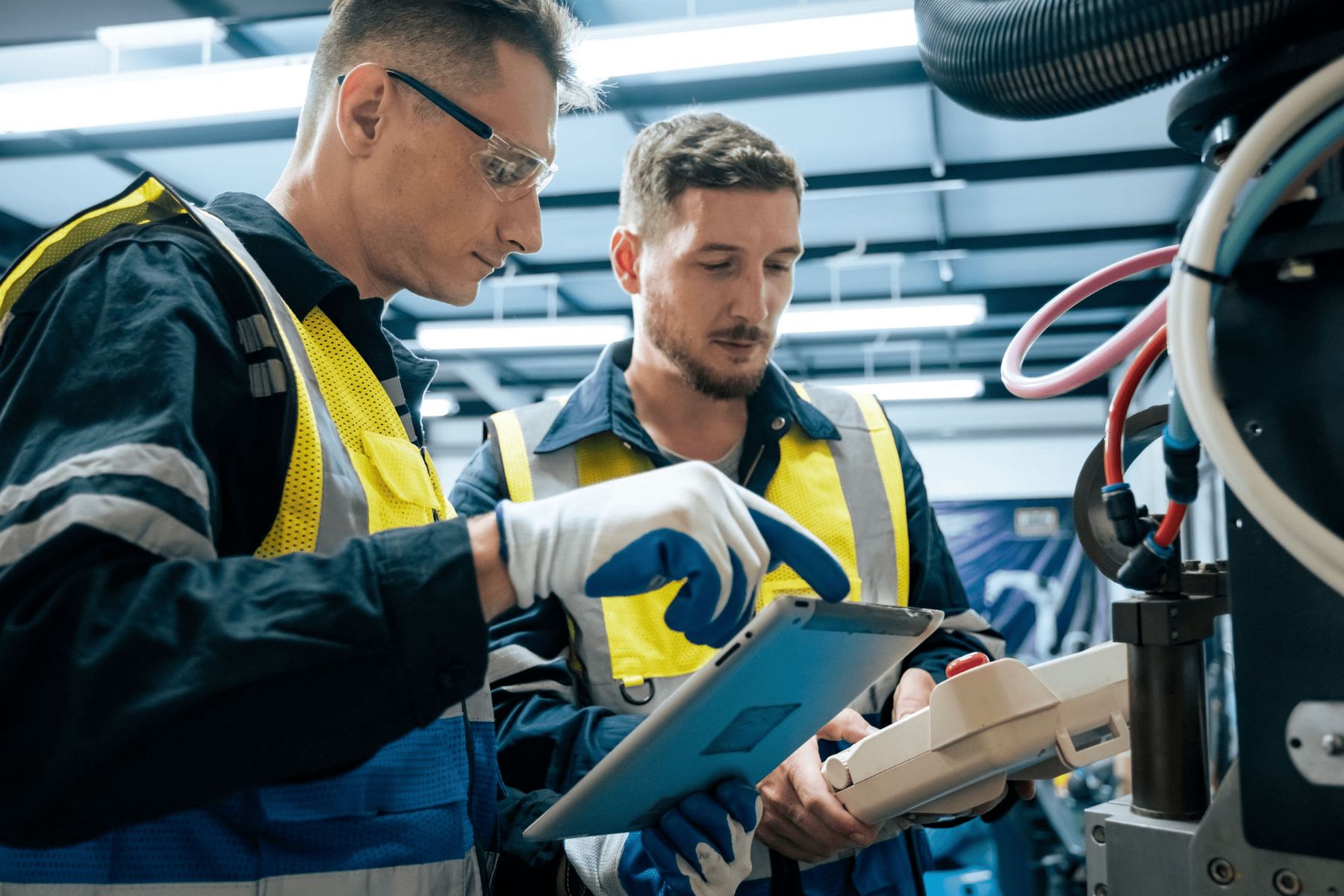 Technicians checking battery diagnostics in the field